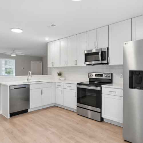 Unfurnished LYV Six Forks apartment kitchen with stainless steel appliances and granite countertops