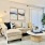 Furnished apartment living room with large windows at LYV Six Forks