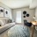 Spacious apartment bedroom furnished as an office at LYV Six Forks