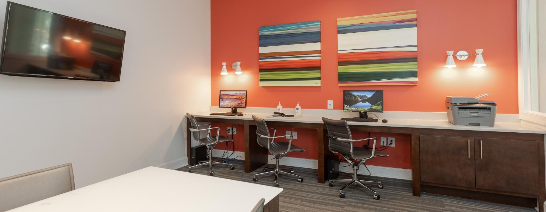 work room with computer stations and printer